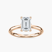 Delicate Four-Prong Emerald Cut Solitaire Engagement Ring