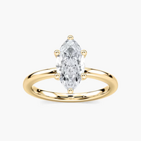 Delicate Four-Prong Marquise Cut Solitaire Engagement Ring