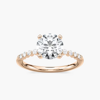 Round Cut Shared Prong Side Stone Engagement Ring