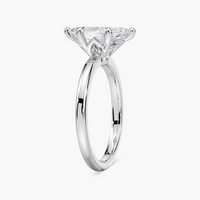 Delicate Four-Prong Marquise Cut Solitaire Engagement Ring
