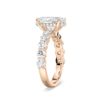 Oval Shaped Shared Prong Engagement Ring with Hidden Halo