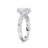 Oval Shaped Shared Prong Engagement Ring with Hidden Halo