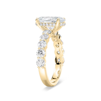 Oval Shaped Shared Prong Engagement Ring with Hidden Halo