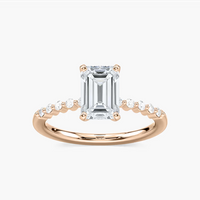 Emerald Cut Shared Prong Side Stone Engagement Ring