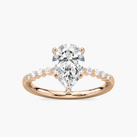 Pear Shaped Shared Prong Side Stone Engagement Ring