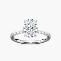 Oval Cut Shared Prong Side Stone Engagement Ring