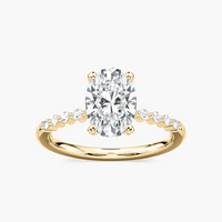 Oval Cut Shared Prong Side Stone Engagement Ring
