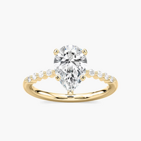 Pear Shaped Shared Prong Side Stone Engagement Ring