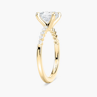 Cushion Cut Shared Prong Side Stone Engagement Ring