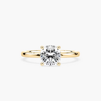 Delicate Four-Prong Cushion Cut Solitaire Engagement Ring