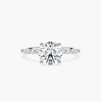 Round Cut Shared Prong Side Stone Engagement Ring