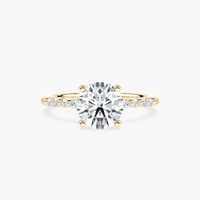 Round Cut Shared Prong Side Stone Engagement Ring