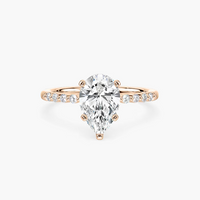 Pear Shaped Shared Prong Side Stone Engagement Ring