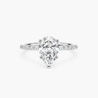 Pear Shaped Shared Prong Side Stone Engagement Ring