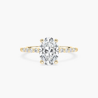 Oval Cut Shared Prong Side Stone Engagement Ring