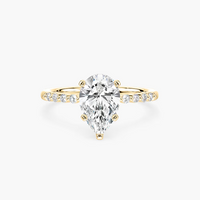 Pear Shaped Shared Prong Side Stone Engagement Ring
