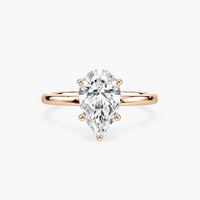 Delicate Four-Prong Pear Shaped Solitaire Engagement Ring