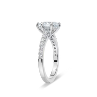 Pear Shared Prong Engagement Ring with Hidden Halo