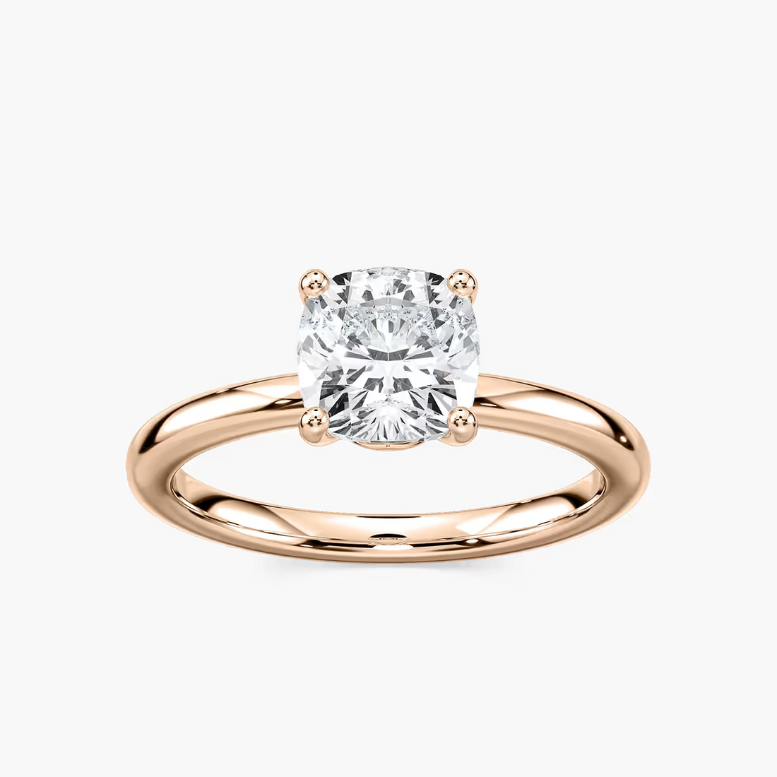 Delicate Four-Prong Cushion Cut Solitaire Engagement Ring