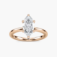 Delicate Four-Prong Marquise Cut Solitaire Engagement Ring