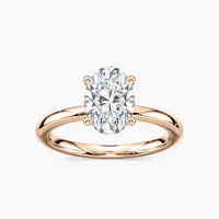 Delicate Four-Prong Oval Solitaire Engagement Ring