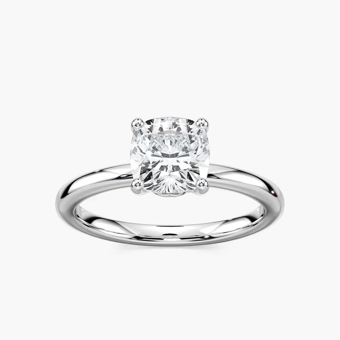 Delicate Four-Prong Cushion Cut Solitaire Engagement Ring