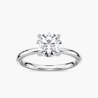 Delicate Four-Prong Round Cut Solitaire Engagement Ring