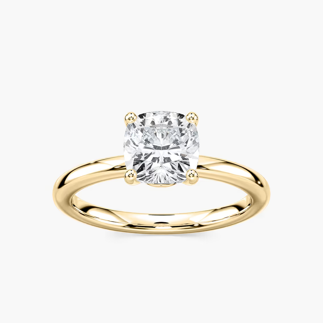 Delicate Four-Prong Cushion Cut Solitaire Engagement Ring