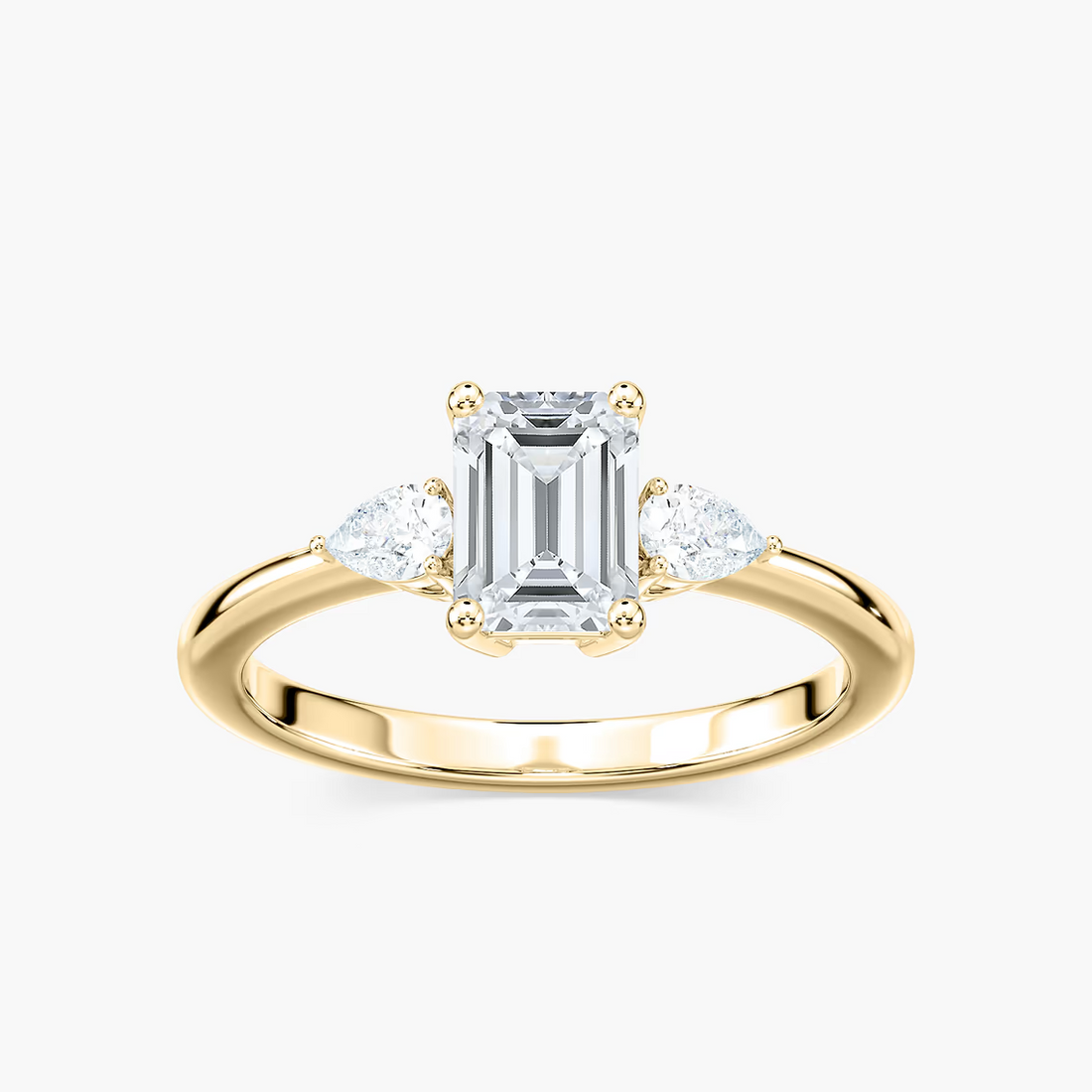 Emerald Cut Three Stone Engagement Ring