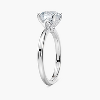 Delicate Four-Prong Round Cut Solitaire Engagement Ring