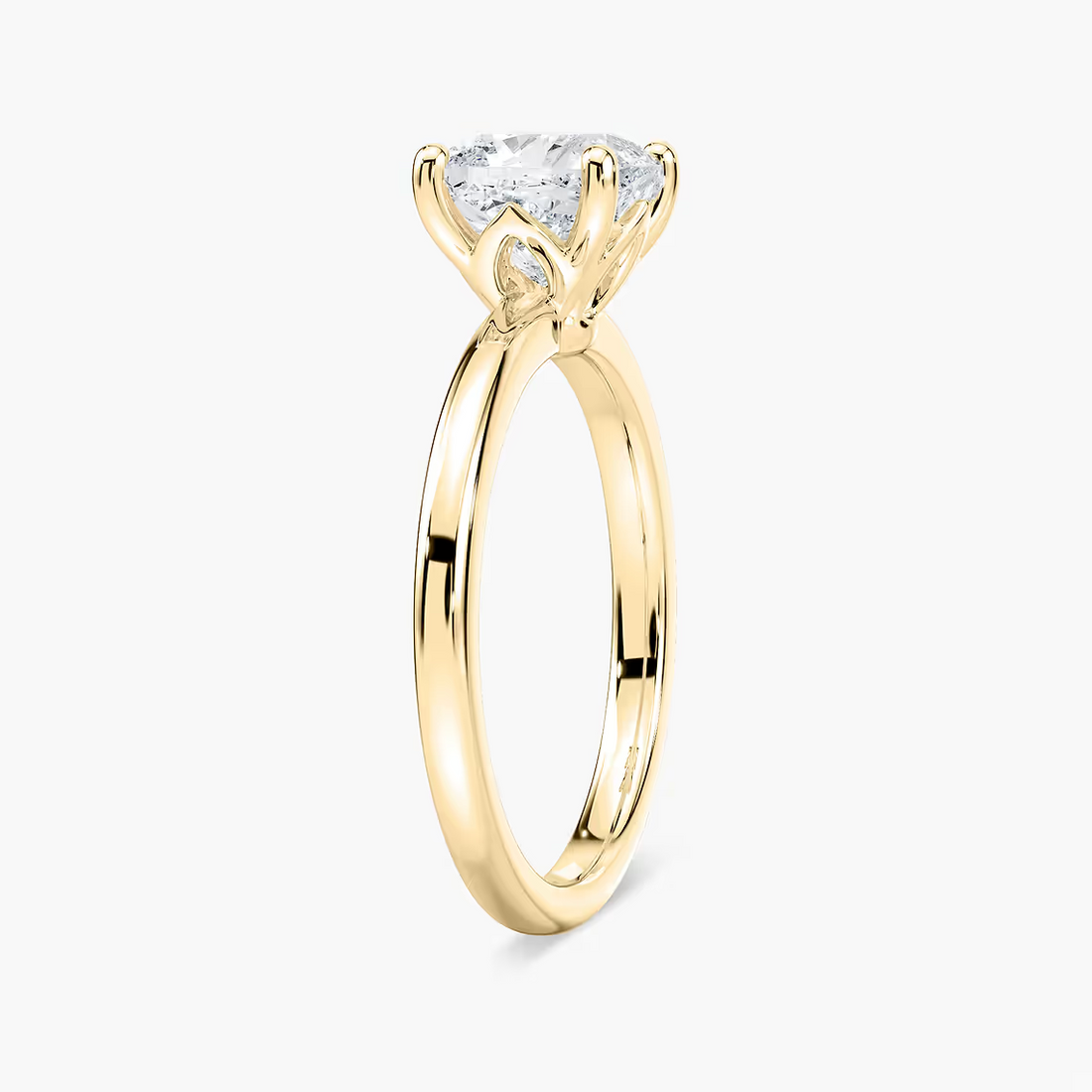 Delicate Four-Prong Cushion Cut Solitaire Engagement Ring