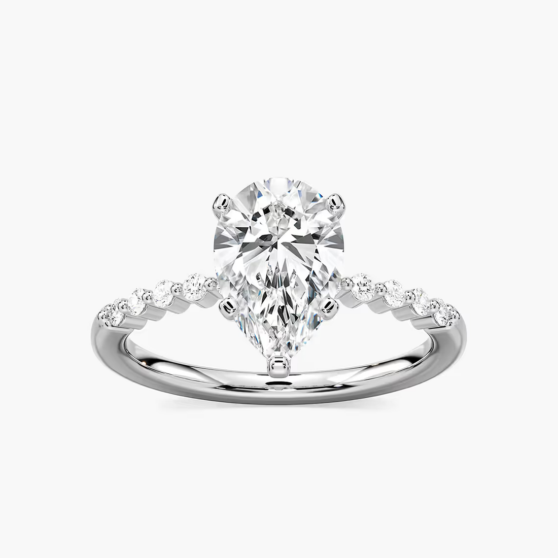 Pear Shaped Shared Prong Side Stone Engagement Ring