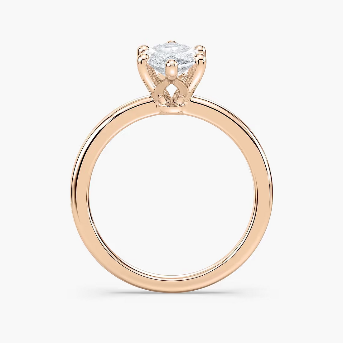 Delicate Four-Prong Marquise Cut Solitaire Engagement Ring