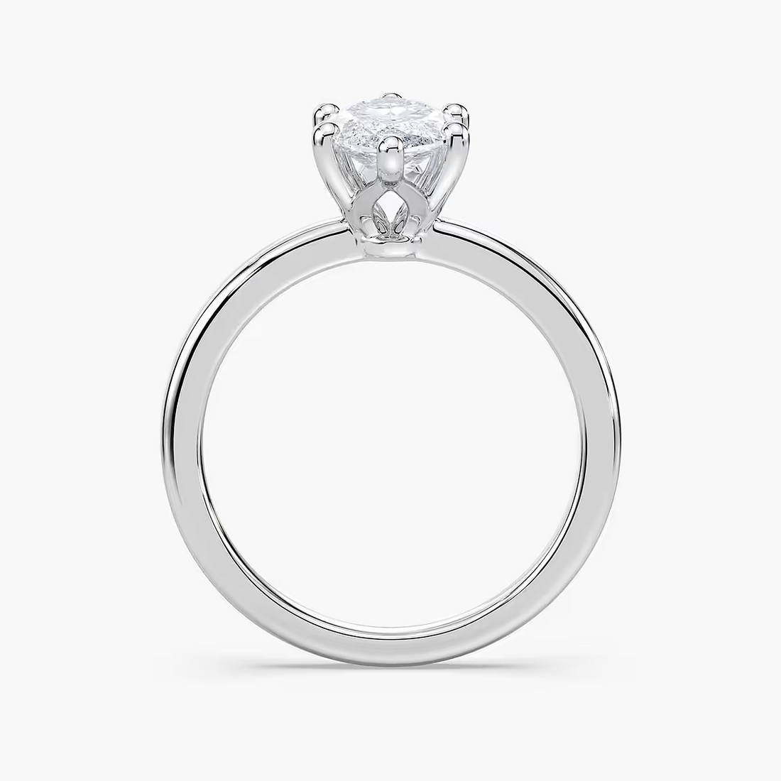 Delicate Four-Prong Marquise Cut Solitaire Engagement Ring