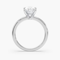 Delicate Four-Prong Oval Solitaire Engagement Ring
