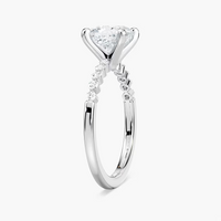 Cushion Cut Shared Prong Side Stone Engagement Ring