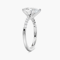 Pear Shaped Shared Prong Side Stone Engagement Ring