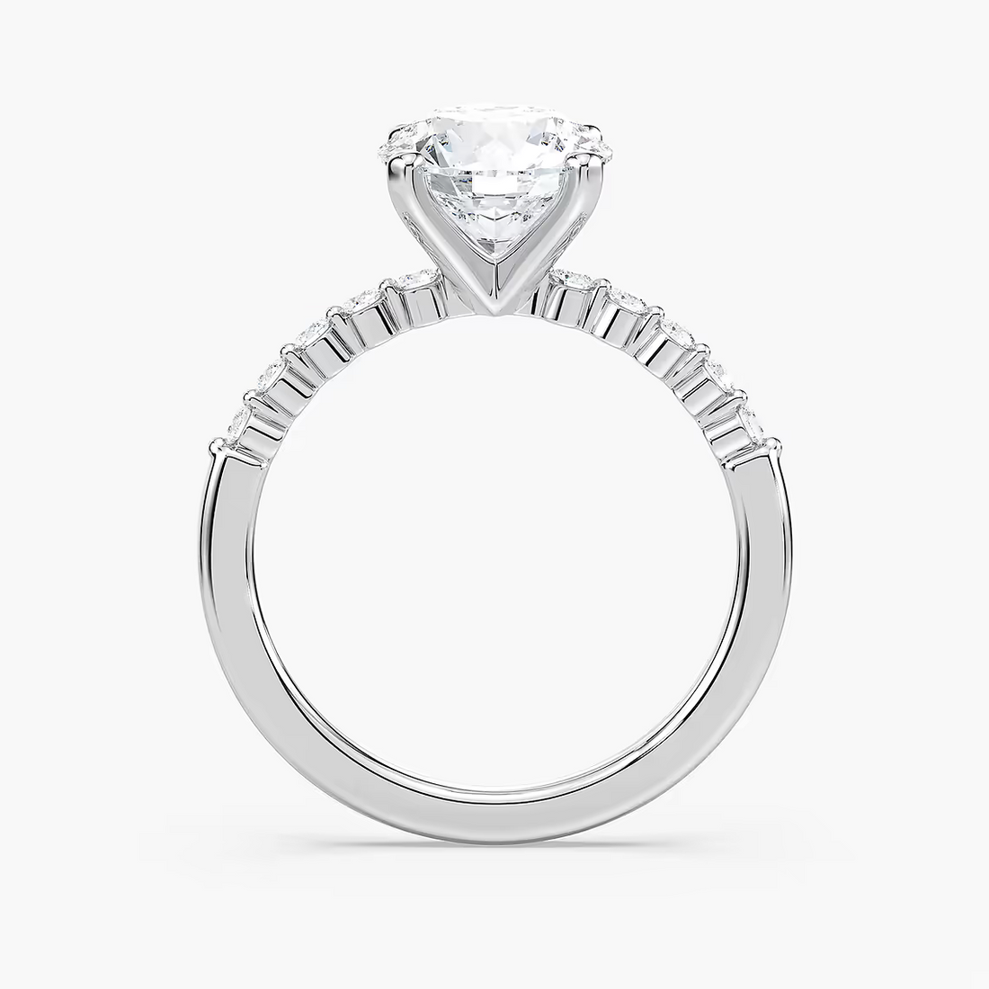 Round Cut Shared Prong Side Stone Engagement Ring