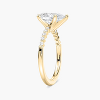 Pear Shaped Shared Prong Side Stone Engagement Ring