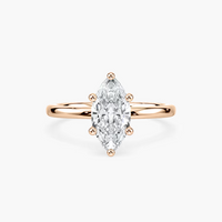 Delicate Four-Prong Marquise Cut Solitaire Engagement Ring