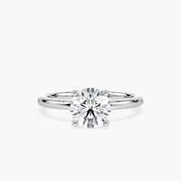 Delicate Four-Prong Round Cut Solitaire Engagement Ring