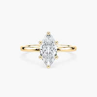 Delicate Four-Prong Marquise Cut Solitaire Engagement Ring