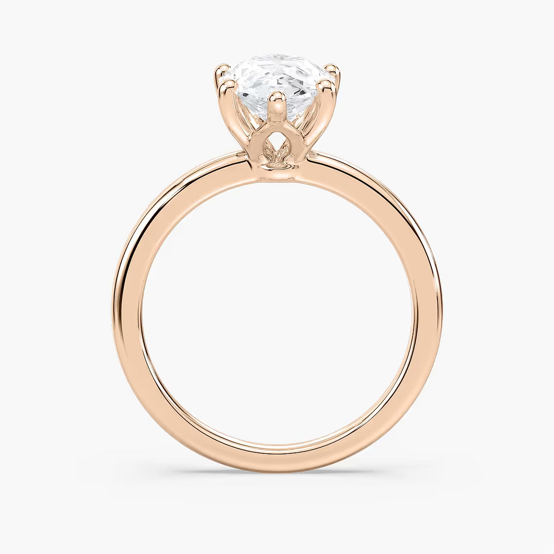 Delicate Four-Prong Pear Shaped Solitaire Engagement Ring