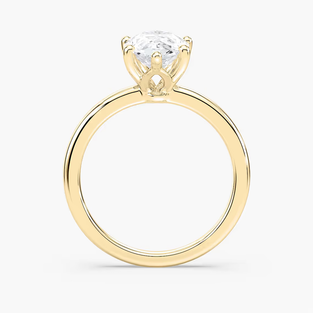 Delicate Four-Prong Pear Shaped Solitaire Engagement Ring