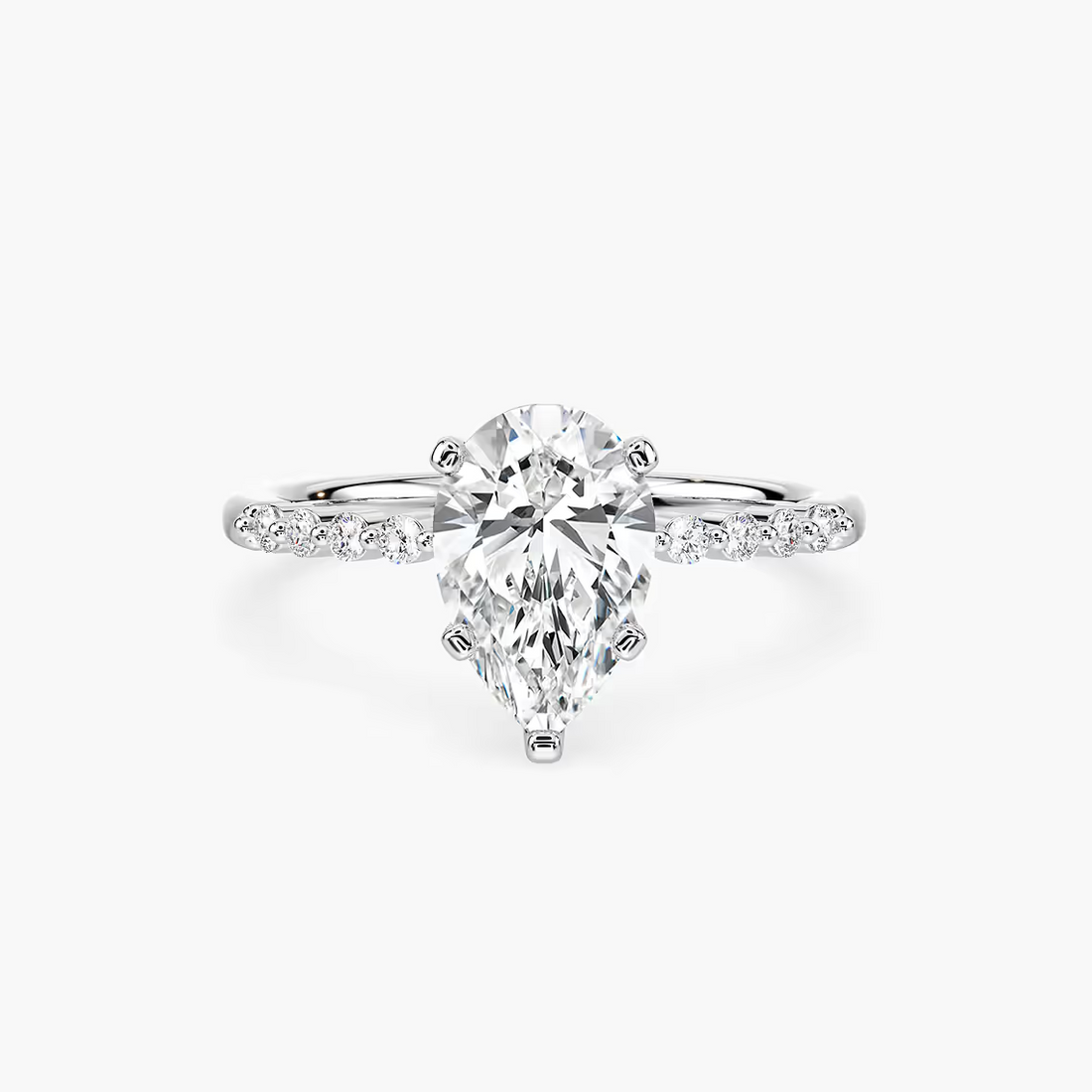 Pear Shaped Shared Prong Side Stone Engagement Ring