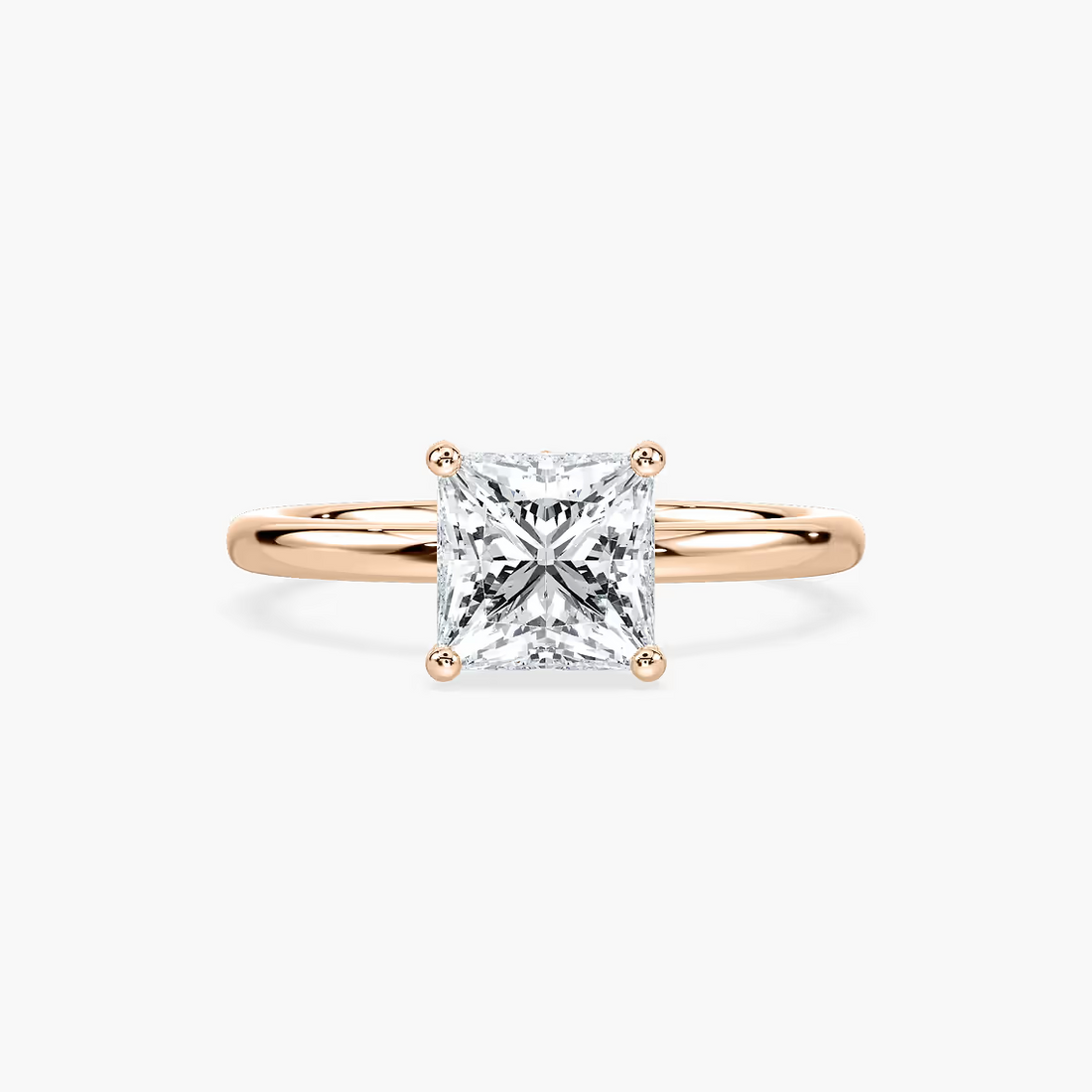 Delicate Four-Prong Princess Cut Solitaire Engagement Ring