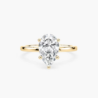 Delicate Four-Prong Pear Shaped Solitaire Engagement Ring