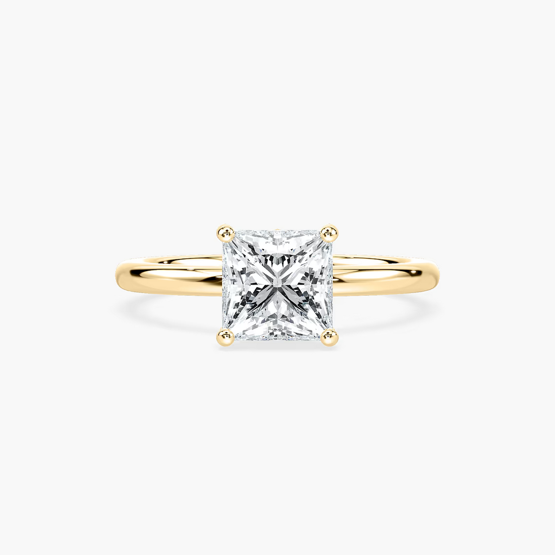 Delicate Four-Prong Princess Cut Solitaire Engagement Ring